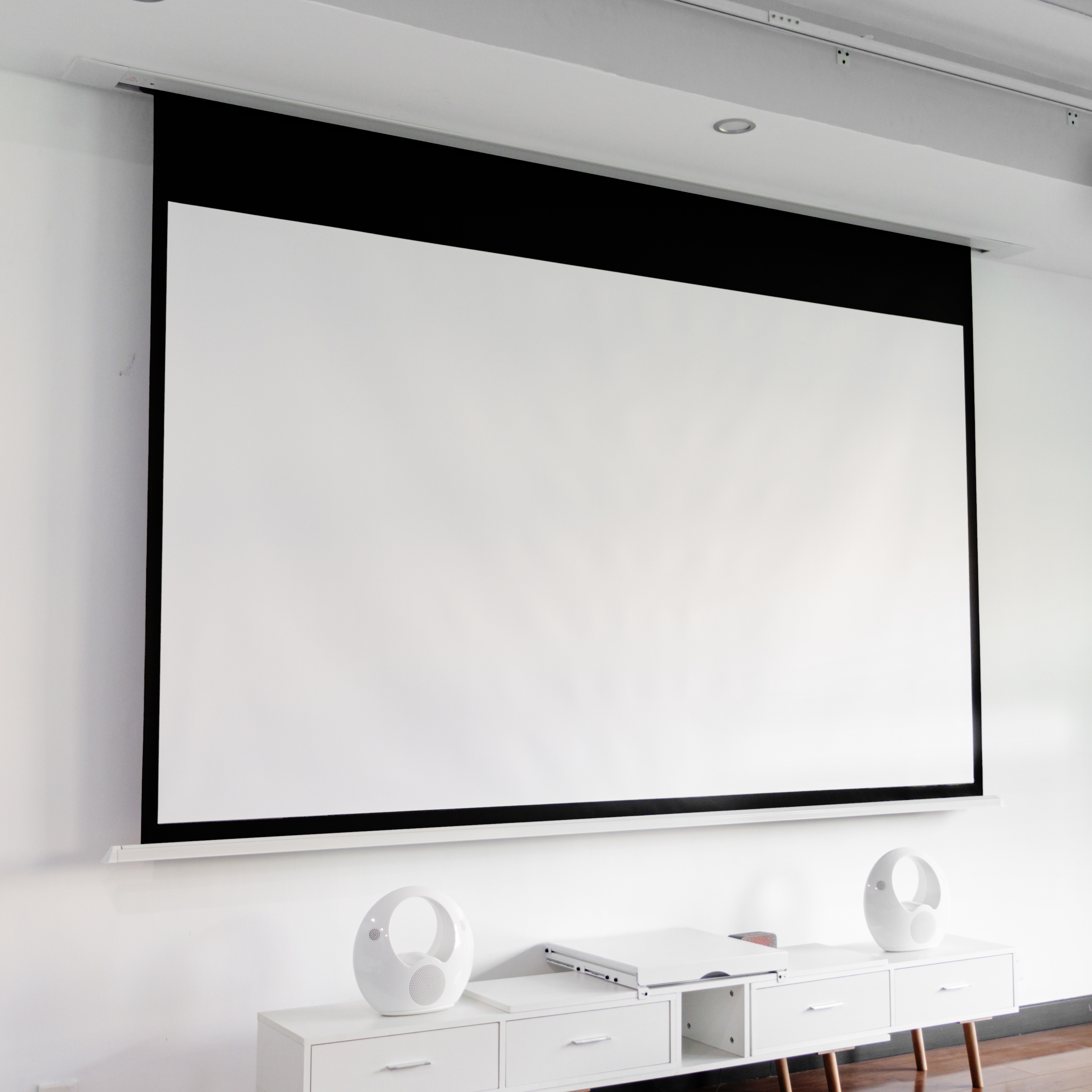 Installed in-ceiling electric projection screen